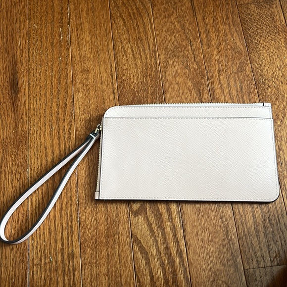 Barely used Kate Spade Lucy Medium L-Zip Wristlet light pink - Picture 2 of 3